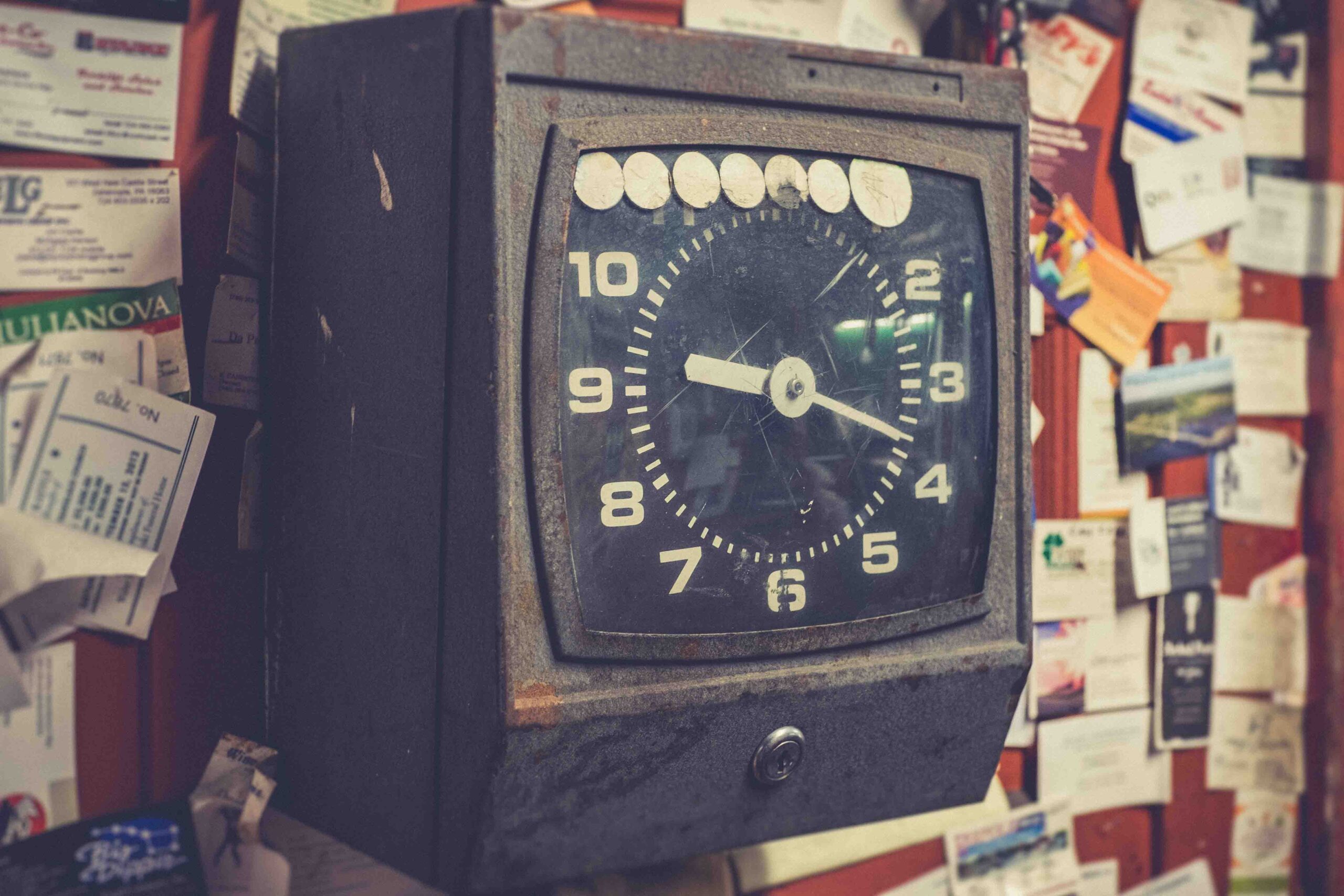 a picture of a time clock to prevent unpaid wages