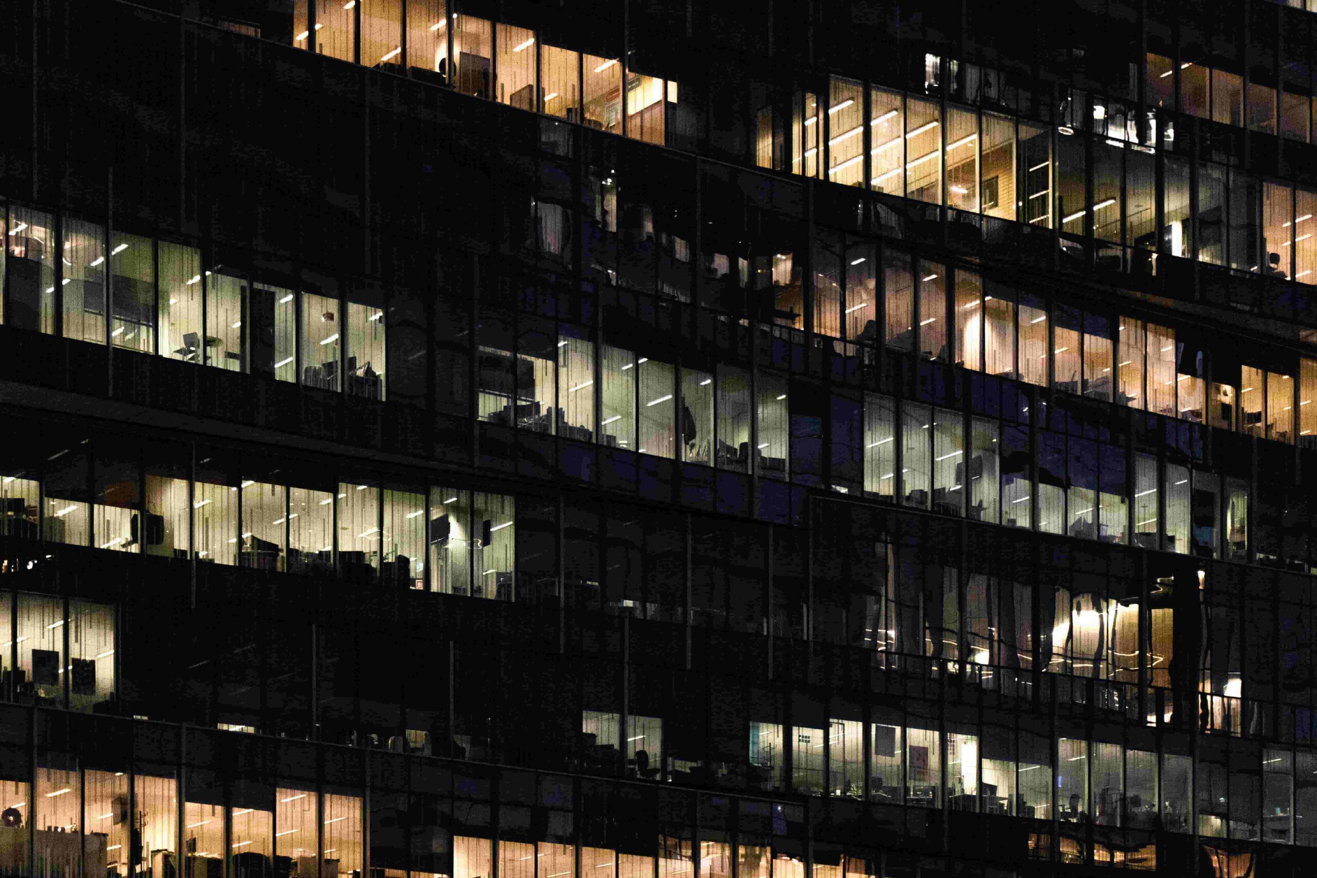 a picture of a business building at night