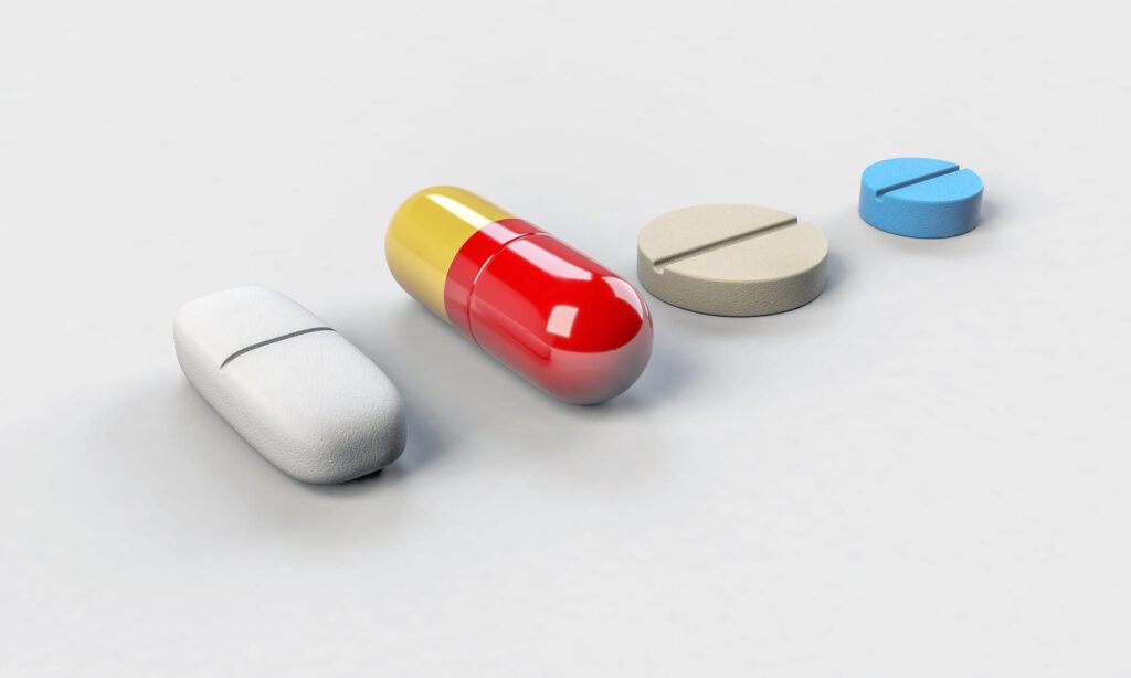 A row of prescription medications leading to duty of care law violations